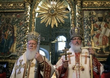 Newly elected Russian Orthodox Patriarch Kirill, right, leads Sunday prayers with Istanbul Ecumenical Patriarch Bartholomew I, left, in a show of unity at the patriarchal church of Aya Yorgi (St. George)in Istanbul, Turkey, Sunday, July 5, 2009. The churches in Istanbul and Moscow have been jostling for influence for years, but recently have pledged to overcome differences and achieve greater unity. Orthodox churches are largely autonomous, but the Istanbul-based Patriarchate is considered first among equals.(AP Photo/Ibrahim Usta)